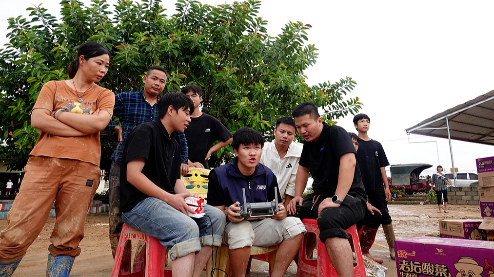 Volunteers use drones to transport supplies, Nanning, south China's Guangxi Zhuang Autonomous Region, July 7, 2026. /VCG