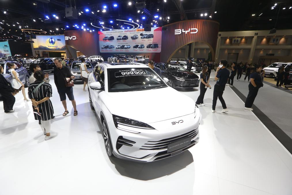 People visit the booth of Chinese carmaker BYD at the 42nd Thailand International Motor Expo in Bangkok, Thailand, December 2, 2025. /Xinhua