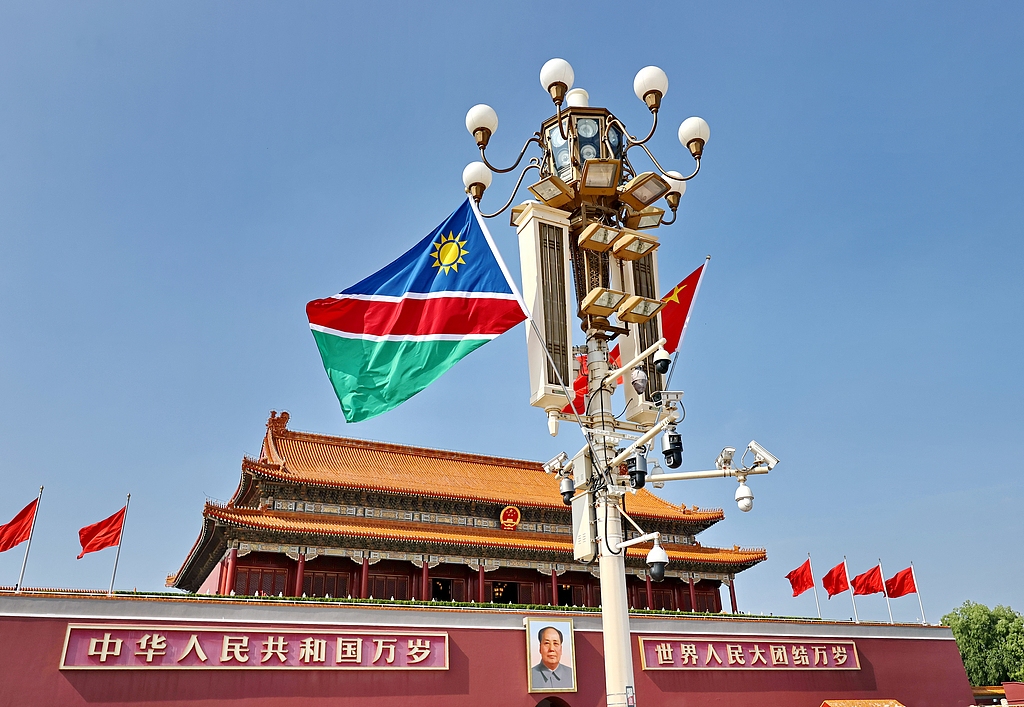 The national flag of Namibia (L) flies alongside the national flag of China on a lamppost in front of Tiananmen Square in Beijing, China, July 9, 2026. /VCG