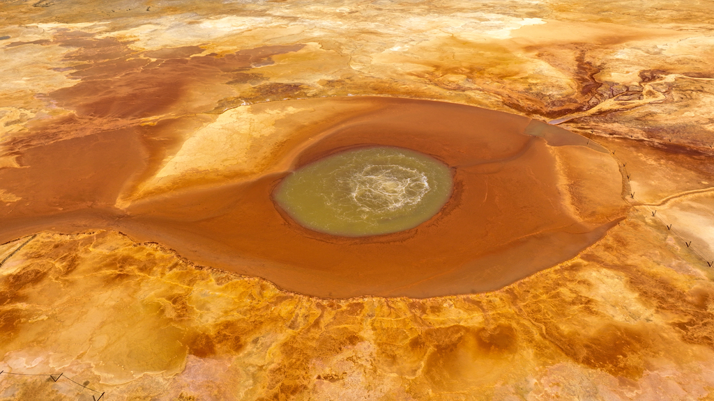 Aerial shots taken on July 3, 2026 capture views of Aiken Spring in Mangya City, Haixi Mongolian and Tibetan Autonomous Prefecture, Qinghai Province. /VCG
