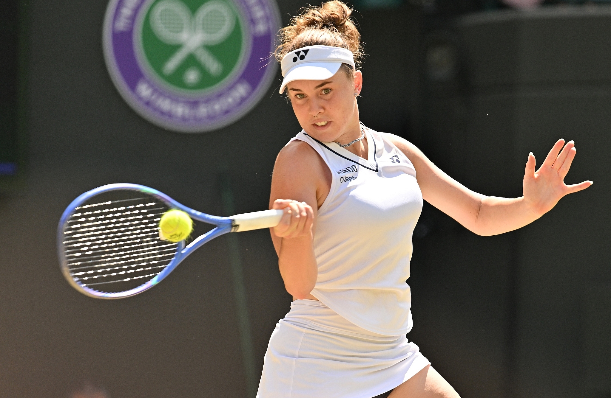 Czechia's Linda Noskova hits a shot against Belgium's Elise Mertens in a women's singles quarterfinal match at the Wimbledon Championships at the All England Lawn Tennis and Croquet Club in London, England, UK, July 8, 2026. /VCG