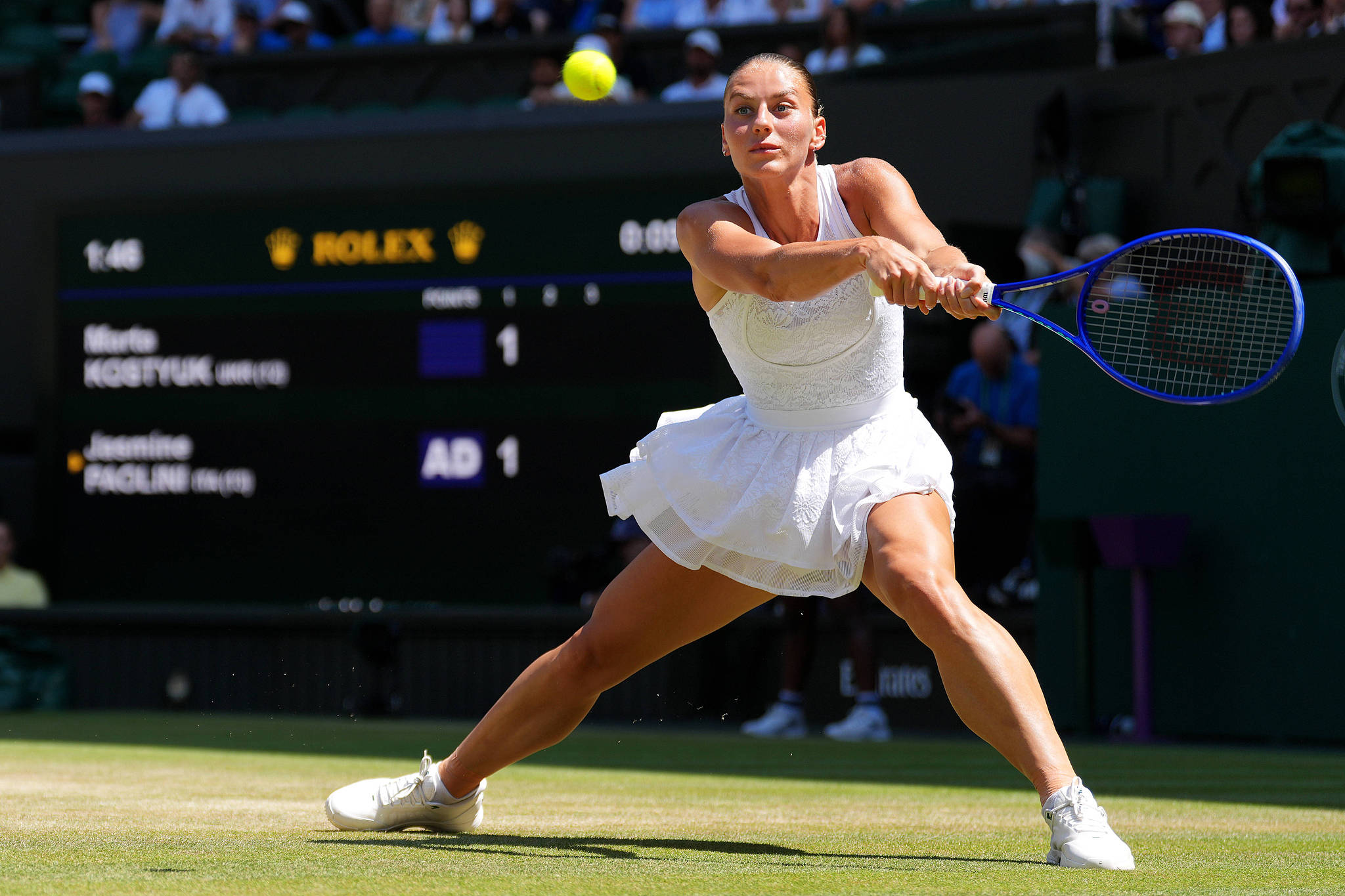 Ukraine's Marta Kostyuk hits a shot against Italy's Jasmine Paolini in a women's singles quarterfinal match at the Wimbledon Championships at the All England Lawn Tennis and Croquet Club in London, England, UK, July 8, 2026. /VCG