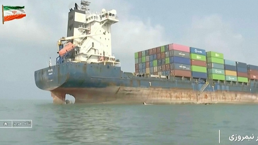 This frame grab from footage aired by Iranian state television shows a vessel that ran aground in the Strait of Hormuz, July 1, 2026. /VCG