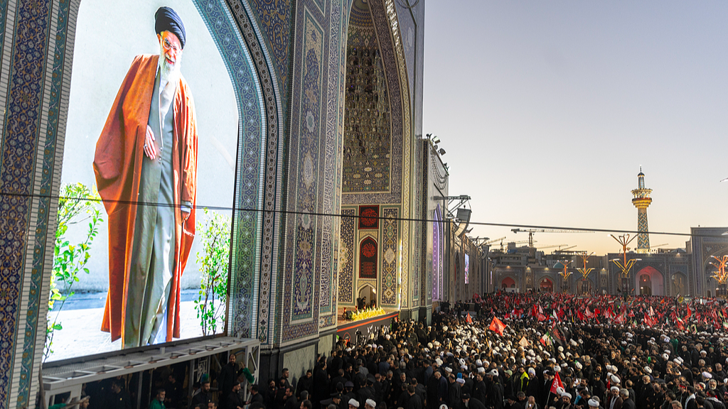 Huge crowds gather for the burial of Iran's late Supreme Leader Ayatollah Ali Khamenei at the Imam Reza Shrine in Mashhad, Iran, July 9, 2026. /VCG