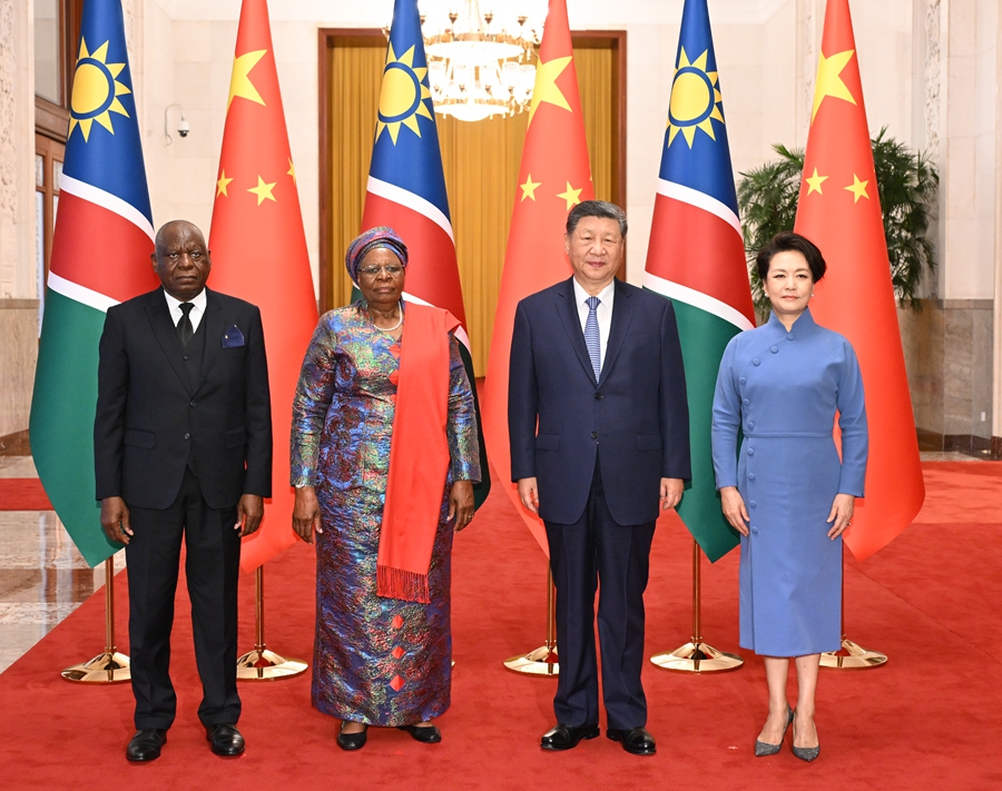 Chinese President Xi Jinping and his wife, Peng Liyuan, pose for a group photo with Namibian President Netumbo Nandi-Ndaitwah and her husband, Epaphras Denga Ndaitwah, at the Great Hall of the People in Beijing, July 10, 2026. /Xinhua
