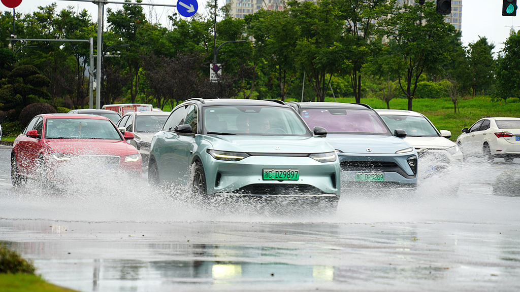 Cars drive through streets in Yueqing, eastern China's Zhejiang Province, July 11, 2026. /VCG