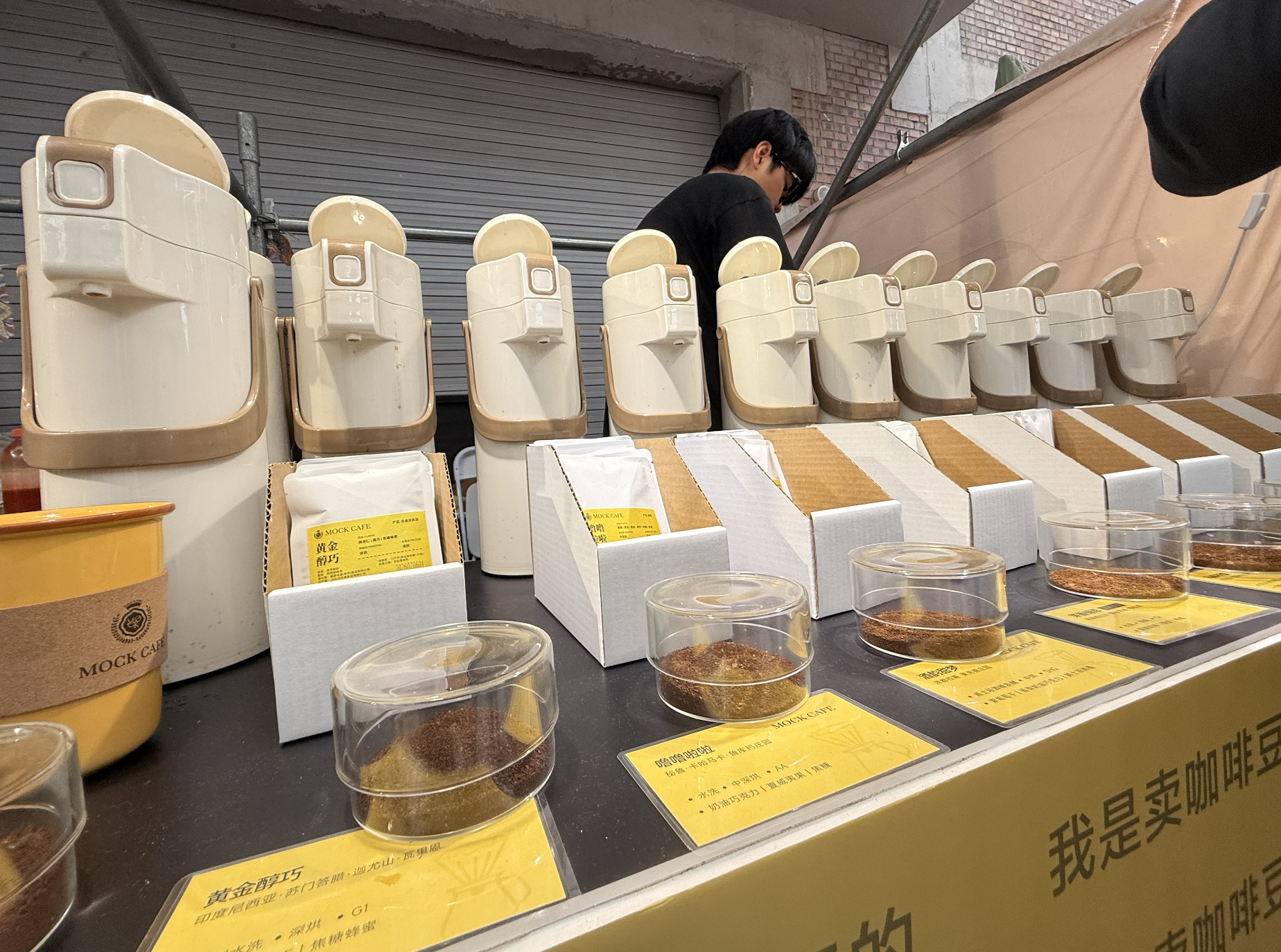 A variety of ground coffee displayed at the Langyuan Station Coffee Festival, July 11-12, 2026. /Zaruhi Poghosyan