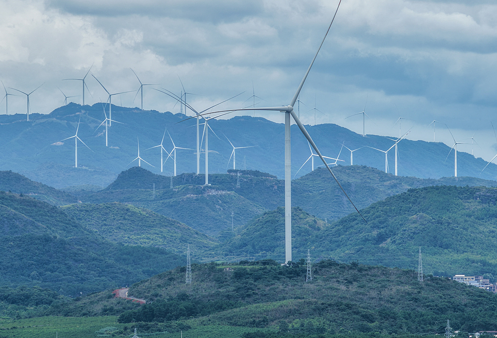 Wind turbines stood scattered across the peaks of green mountains, Yongzhou City, central China's Hunan Province, July 5, 2026. /VCG