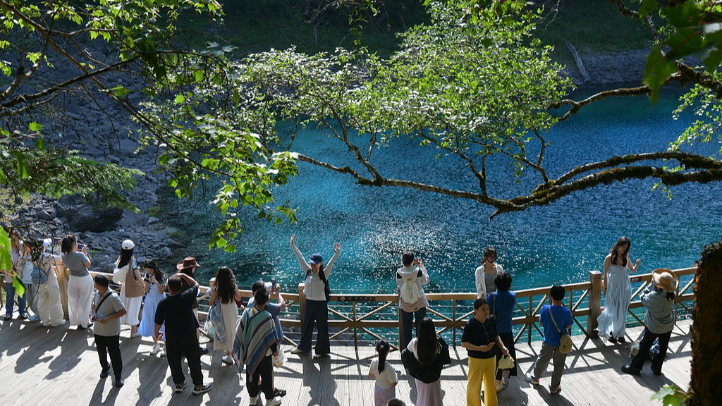 Beyond escaping the heat: Why China is drawing summer travelers