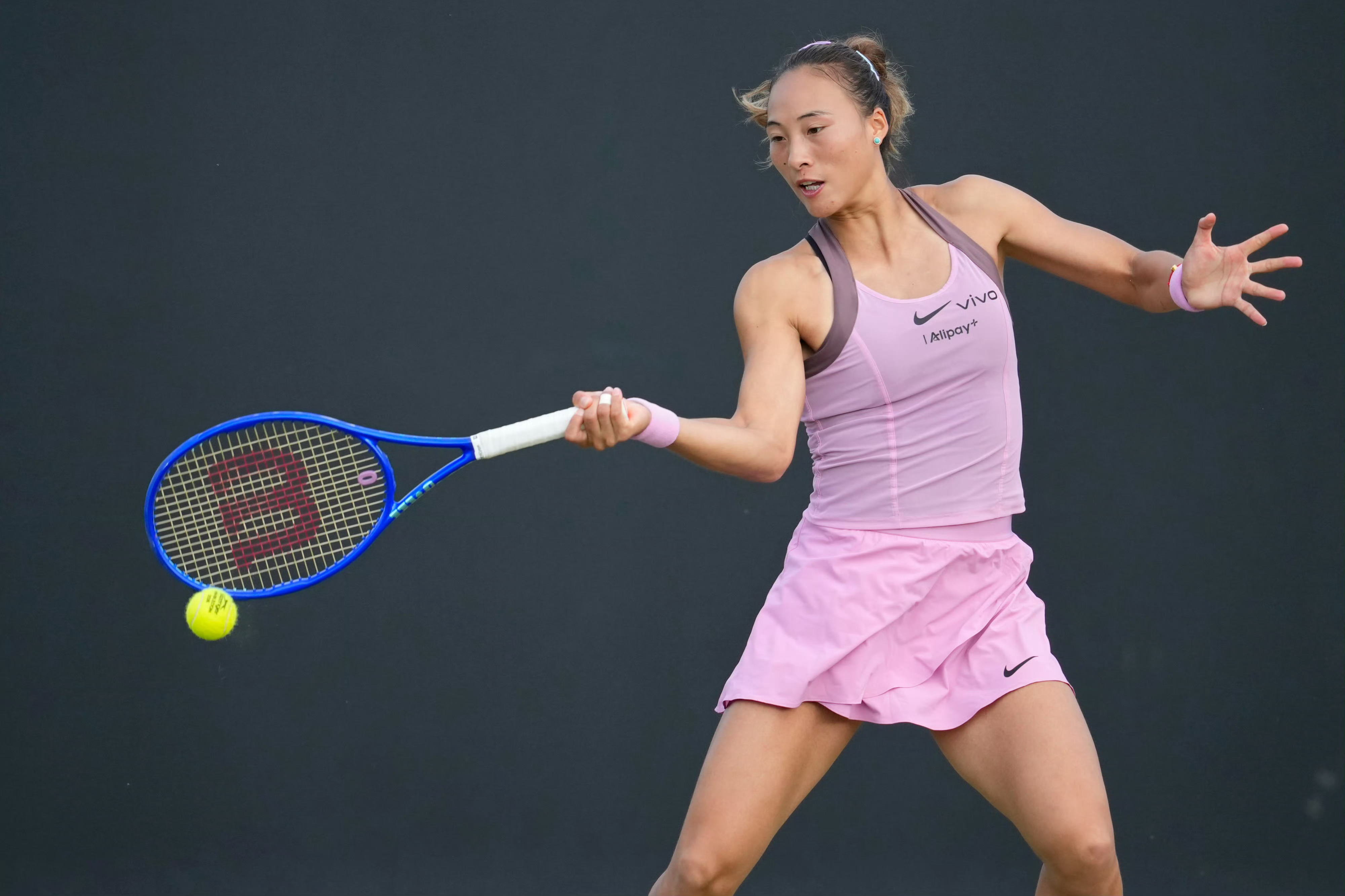 China's Zheng Qinwen hits a shot in the women's singles first-round match against Spain's Jessica Bouzas Maneiro at the Athens Open in Athens, Greece, July 13, 2026. /Xinhua