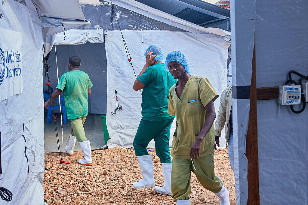 Health workers walk around at the Evangelical Medical Center in Bunia, eastern Democratic Republic of the Congo, where Ebola clinical trials are scheduled to take place, July 3, 2026. /VCG