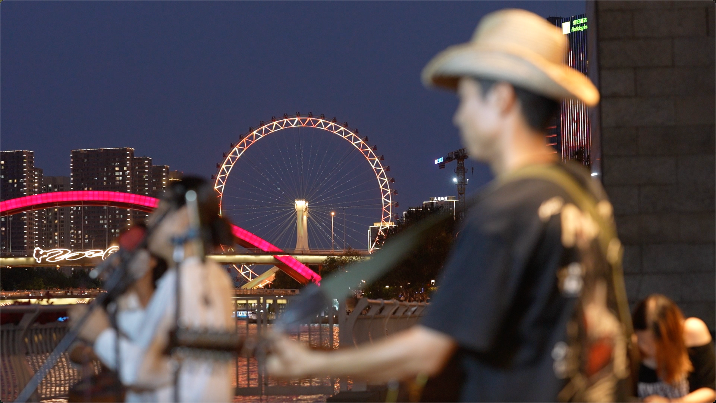 A band plays music alongside the Haihe River in Tianjin, northern China on July 9, 2026. /CGTN