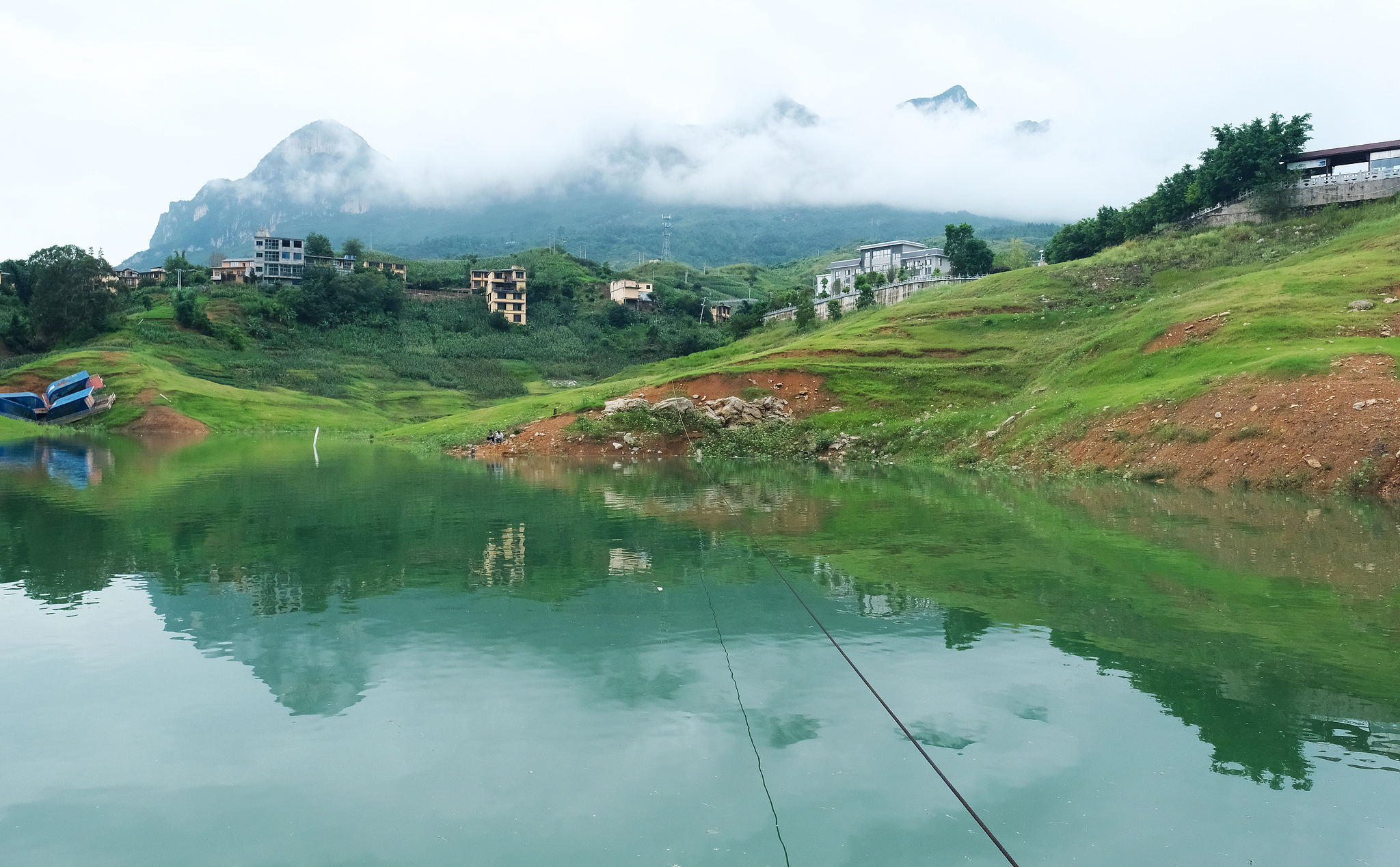 Misty mountains and waters along the Zangke River after a summer rain, Liupanshui, southwest China's Guizhou Province, June 26, 2026. /VCG