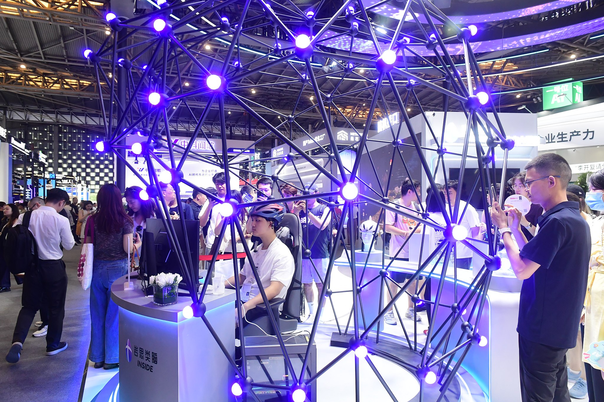 Visitors experience a brain-computer interface at the World Artificial Intelligence Conference 2026 in Shanghai, China, on July 17, 2026. /VCG