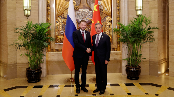 Chinese Foreign Minister Wang Yi (R) meets with Maxim Oreshkin, deputy chief of staff of the Russian Presidential Executive Office, in Shanghai, China, July 17, 2026. /Chinese Foreign Ministry