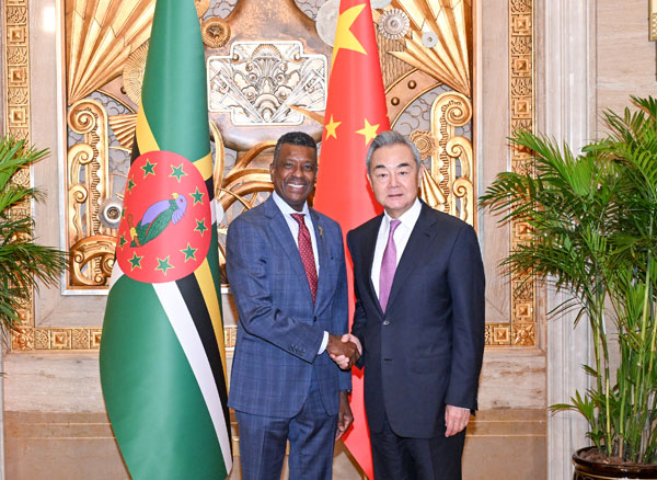 Member of the Political Bureau of the Communist Party of China Central Committee and Chinese Foreign Minister Wang Yi (R) meets with Vince Henderson, foreign minister of the Commonwealth of Dominica, in Shanghai, China, July 18, 2026. /Chinese Foreign Ministry