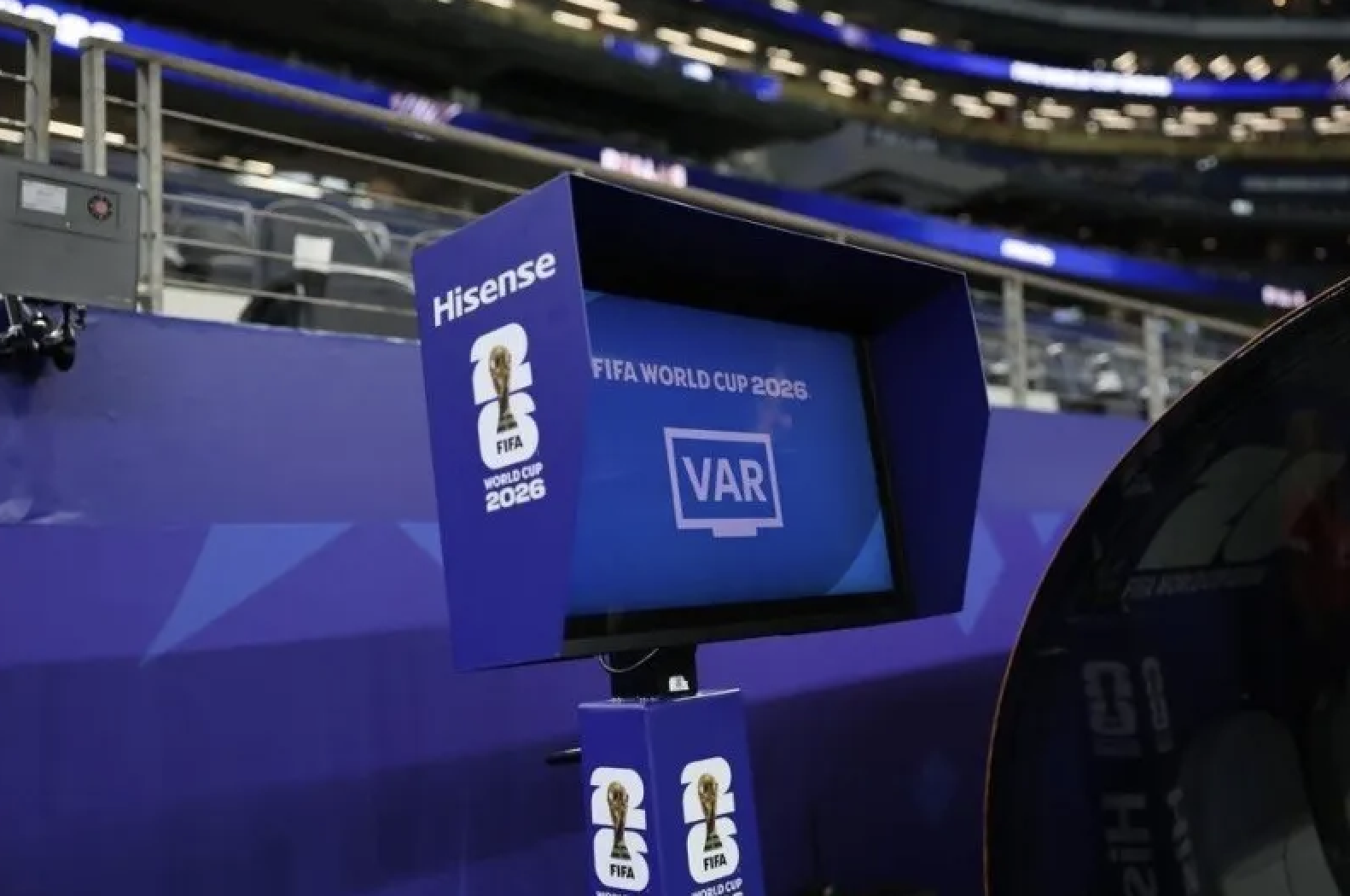 A Hisense screen at the referee's pitch-side VAR review station at a World Cup stadium. /Hisense