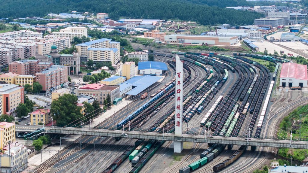 A drone photo taken on July 13, 2026 shows China-Europe freight trains waiting for transshipment at a yard of Suifenhe Station in Suifenhe, northeast China's Heilongjiang Province. /Xinhua