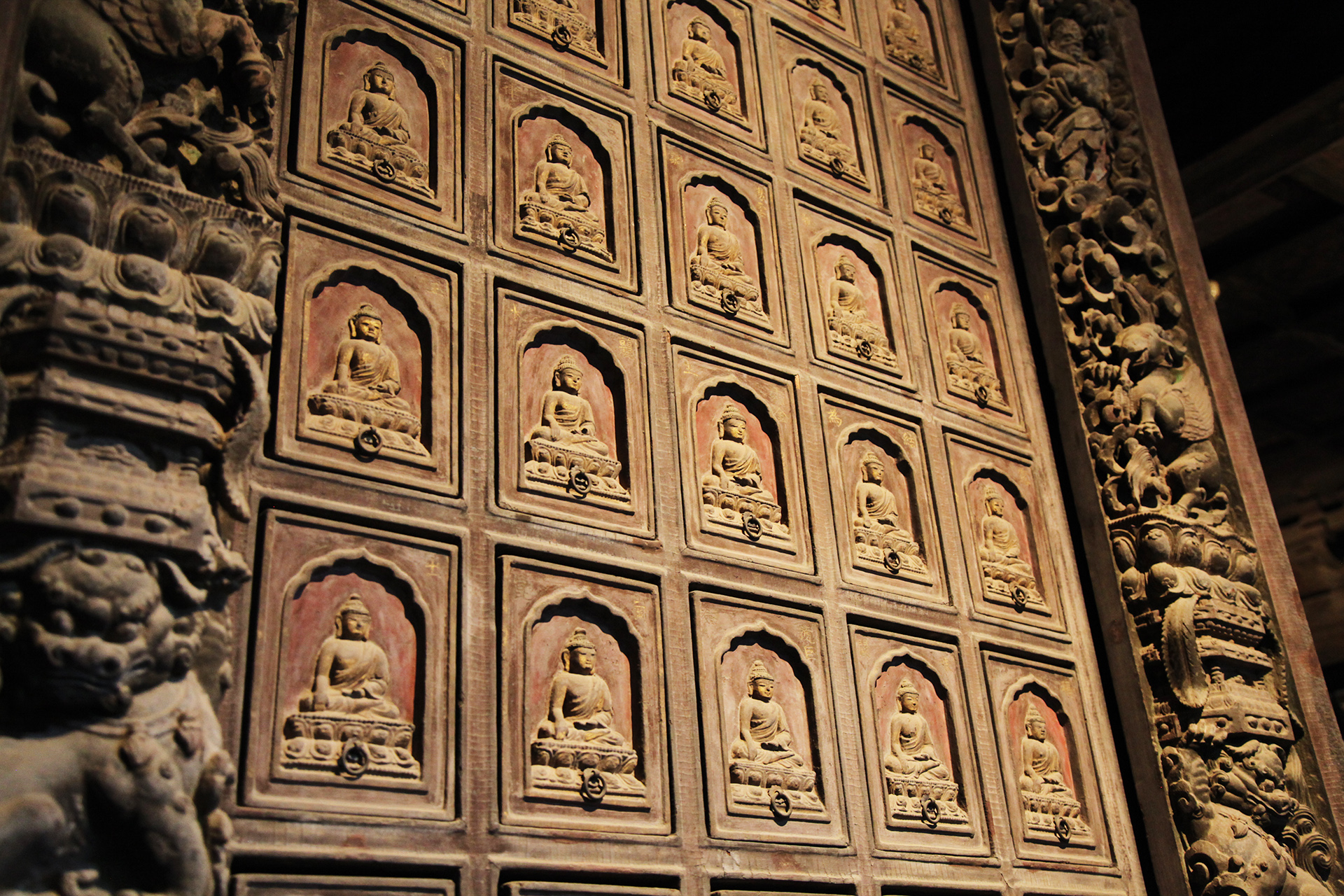 The sutra cabinet at Beijing's Zhihua Temple contains 360 drawers for storing Buddhist scriptures and is decorated with intricate carvings. /CGTN