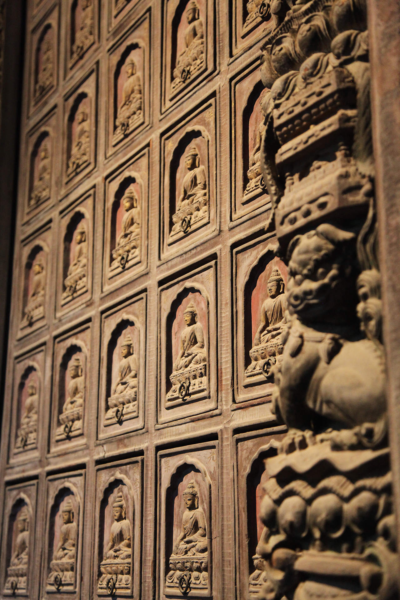 The sutra cabinet at Beijing's Zhihua Temple contains 360 drawers for storing Buddhist scriptures and is decorated with intricate carvings. /CGTN