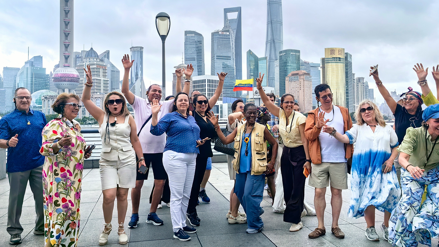Foreign tourists visit the Bund, one of Shanghai's most popular attractions, July 12, 2026. /VCG