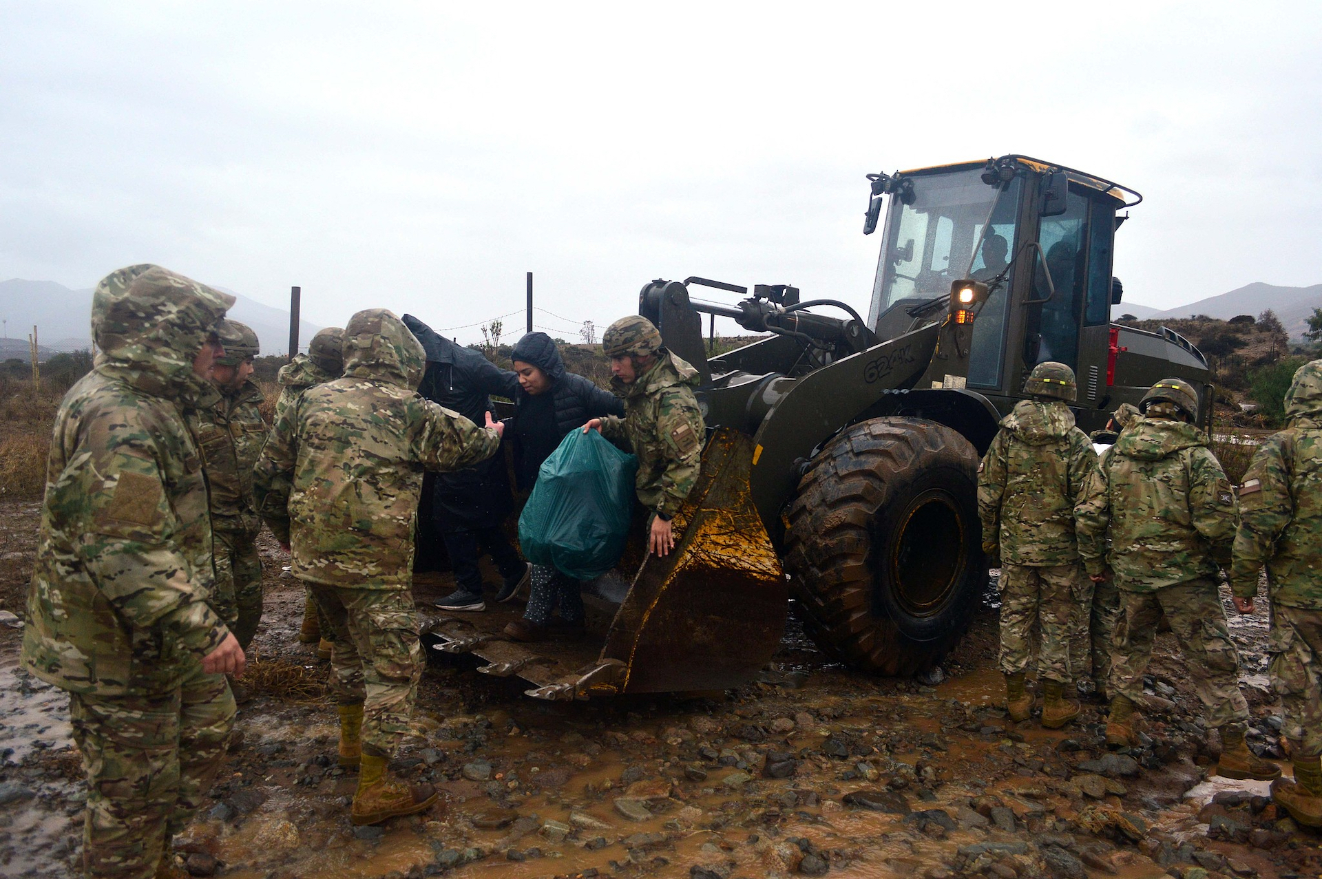 Members of the Chilean Army rescue residents stranded in a rural area of the Coquimbo region following severe weather conditions, July 19, 2026. /VCG