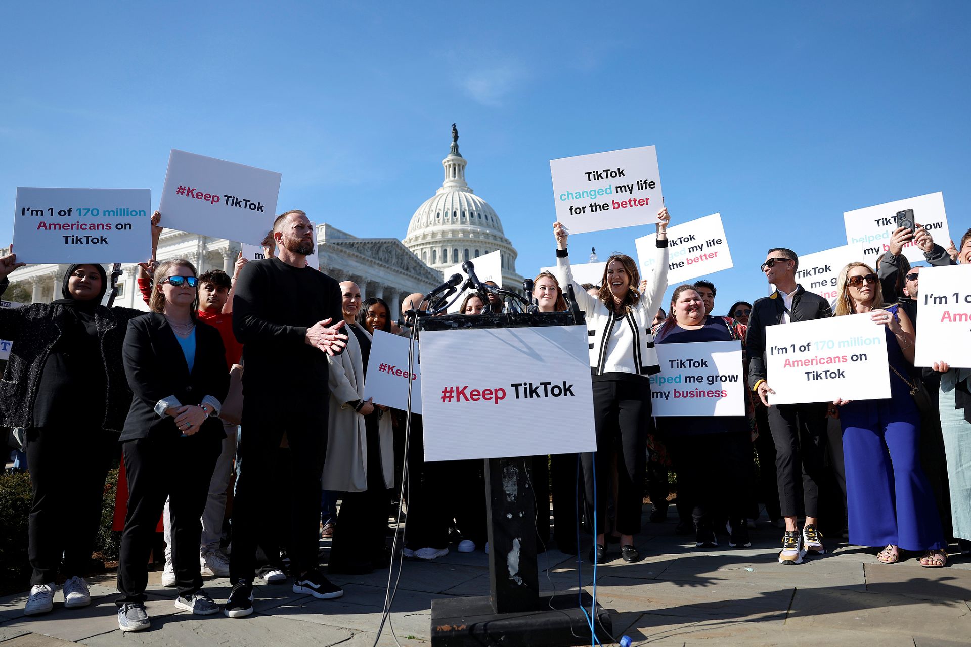 Participants hold up signs in support of TikTok at a news conference outside the US Capitol Building in Washington, DC, March 12, 2024. /CFP