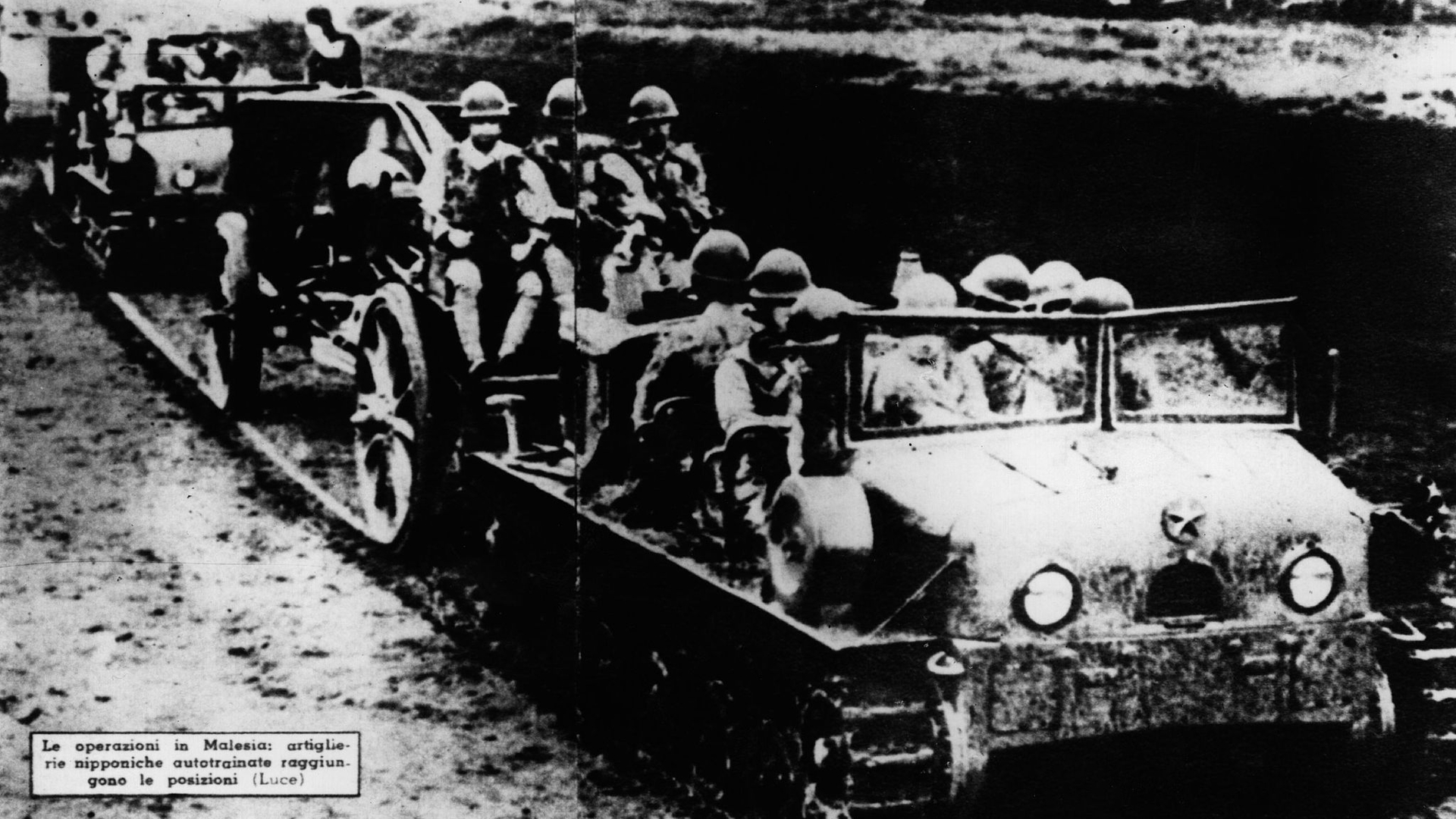 (File) Japanese troops advance with their personnel carriers through Malaya, 1942. /CFP