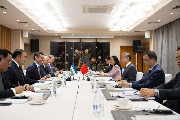 Chinese Foreign Minister Wang Yi, also a member of the Political Bureau of the Communist Party of China Central Committee, meets with Uzbek Foreign Minister Bakhtiyor Saidov ahead of the Meeting of the Council of the Ministers of Foreign Affairs of the Shanghai Cooperation Organization (SCO) Member States in Kyrgyzstan, July 23, 2026. /Chinese Foreign Ministry