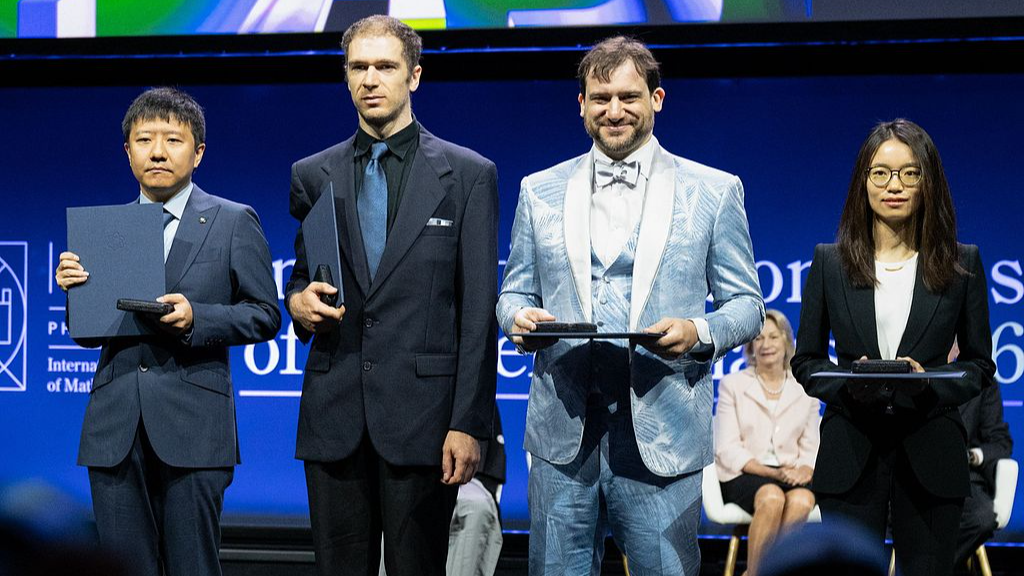 What century-old problems did China's Fields Medalists solve?