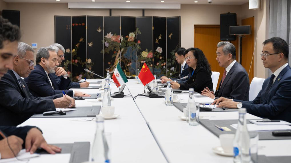 Chinese Foreign Minister Wang Yi, also a member of the Political Bureau of the Communist Party of China Central Committee, meets with Iranian Foreign Minister Seyed Abbas Araghchi on the sidelines of the Meeting of the Council of the Ministers of Foreign Affairs of the Shanghai Cooperation Organization Member States in Kyrgyzstan, July 24, 2026. /Xinhua