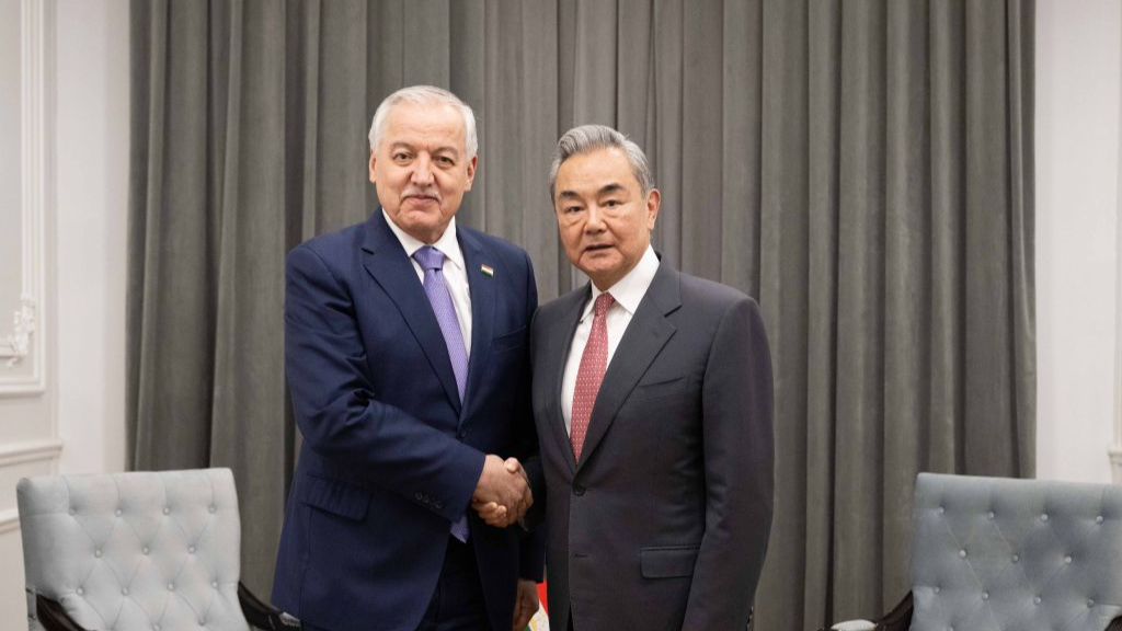 Chinese Foreign Minister Wang Yi, also a member of the Political Bureau of the Communist Party of China Central Committee, meets with Tajik Foreign Minister Sirojiddin Muhriddin on the sidelines of the Meeting of the Council of the Ministers of Foreign Affairs of the Shanghai Cooperation Organization Member States in Kyrgyzstan, July 24, 2026. /Xinhua