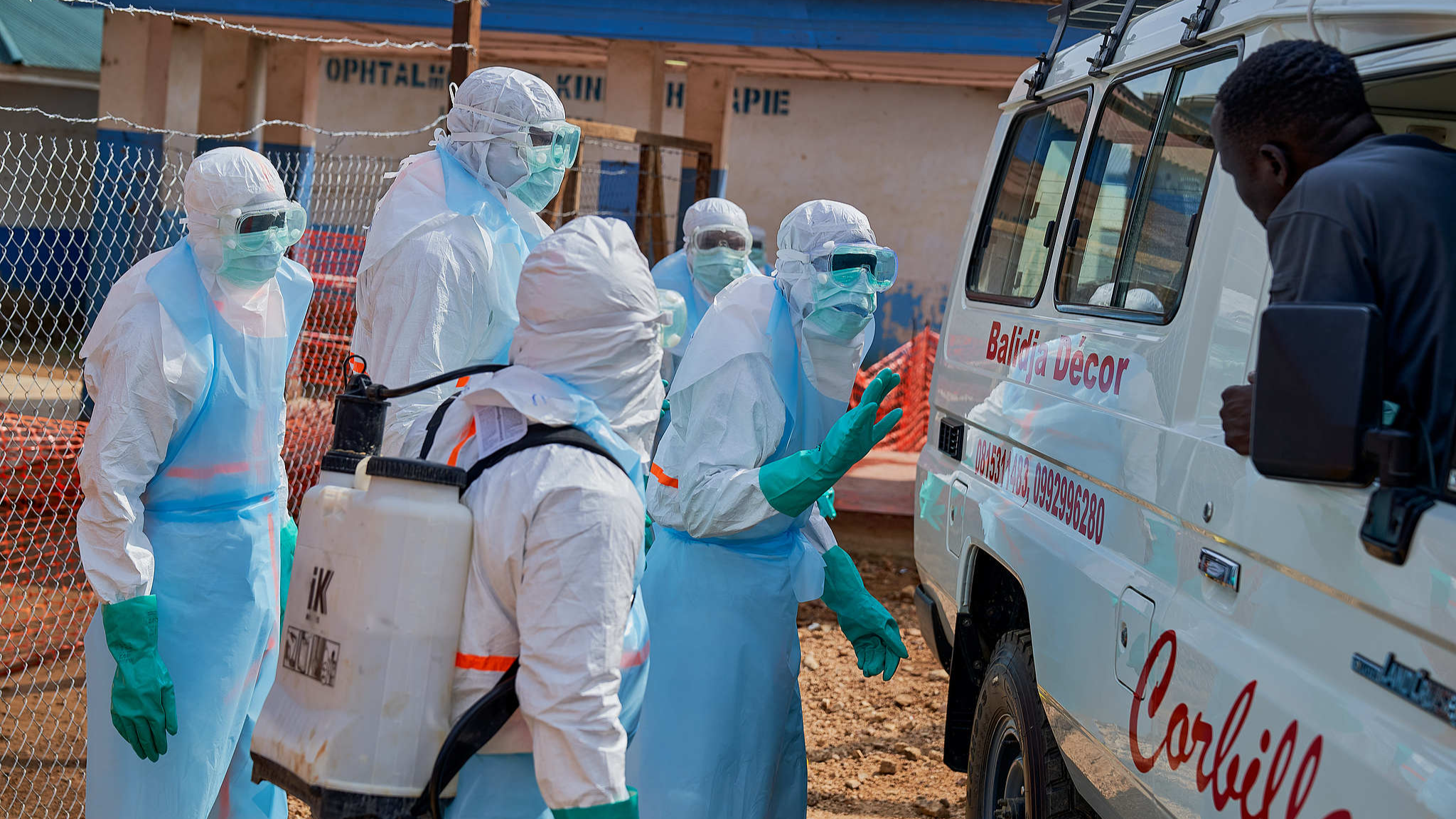 Health workers disinfect a hearse at the Ebola treatment center of the General Hospital in Bunia, Ituri Province, Democratic Republic of the Congo, July 22, 2026. /VCG