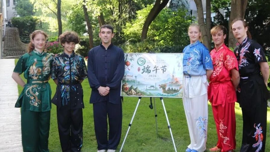 Young people from Slovak Association of Chinese Wushu dressed in traditional Chinese martial arts costumes at the Dragon Boat Festival event, Bratislava, capital of Slovakia, June 18, 2026. /The Confucius Institute in Bratislava
