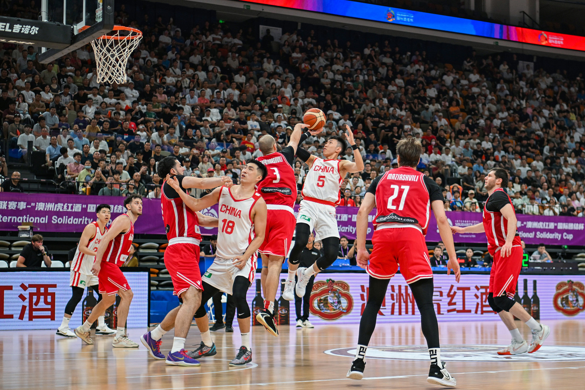 China guard Liao Sanning (#5) shoots in the game against Georgia at the FIBA International Solidarity Cup in Haikou, south China's Hainan Province, July 25, 2026. /VCG