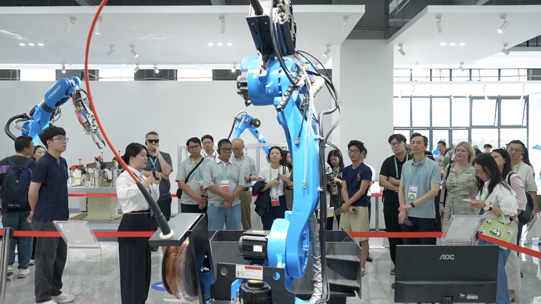 A photo of delegates from APEC economies visiting a leading Chinese industrial robotics company in Chengdu, China, on July 26, 2026./CGTN