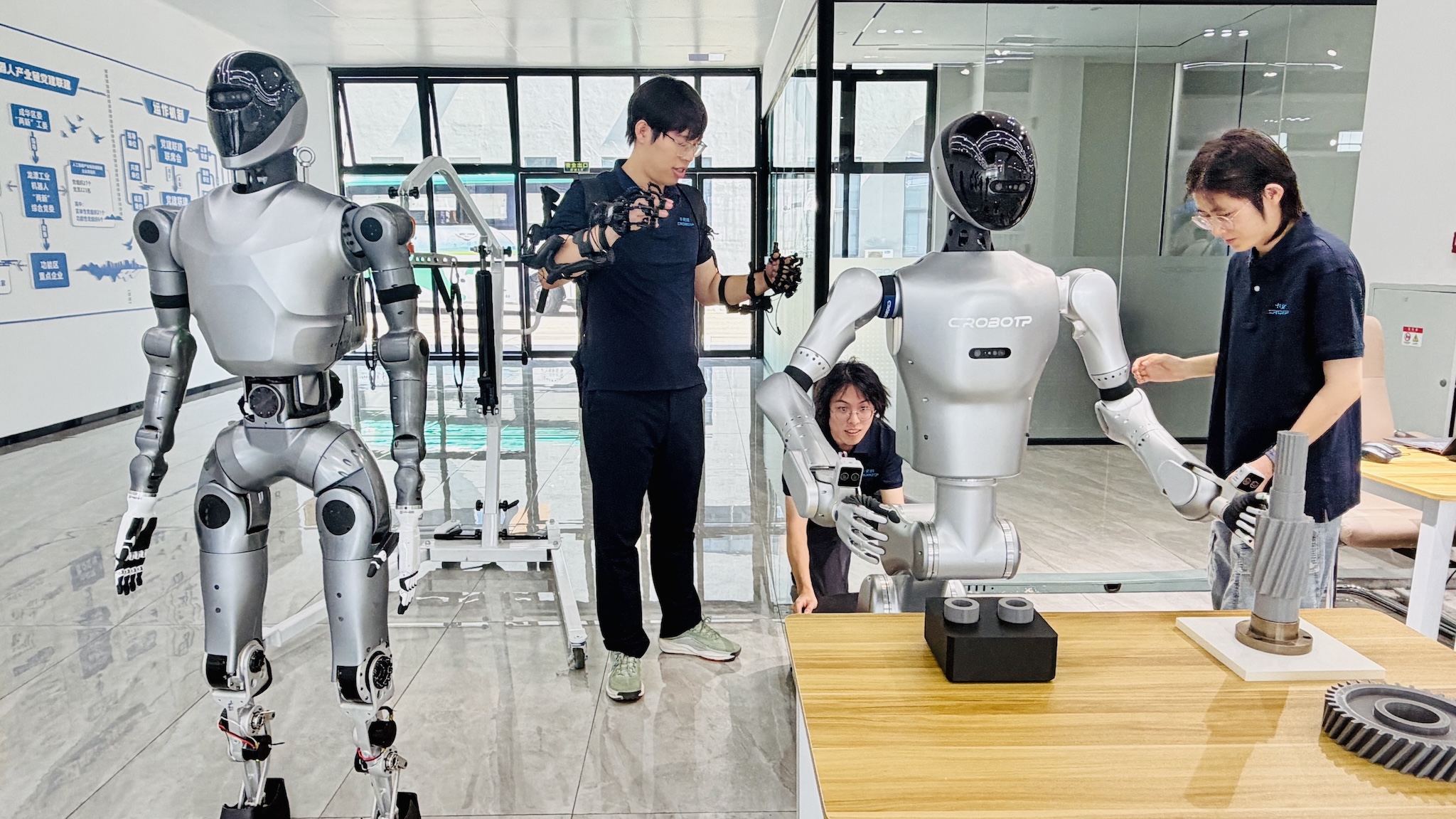 A photo of different kinds of industrial robot models at Chengdu CRP Robot Technology Co., Ltd., Chengdu, China./CGTN