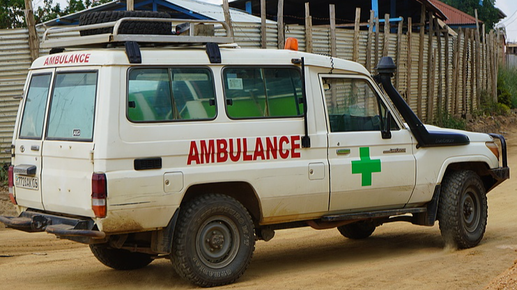 An ambulance drives past an Ebola treatment center in Bunia, the Democratic Republic of the Congo, July 20, 2026. /VCG