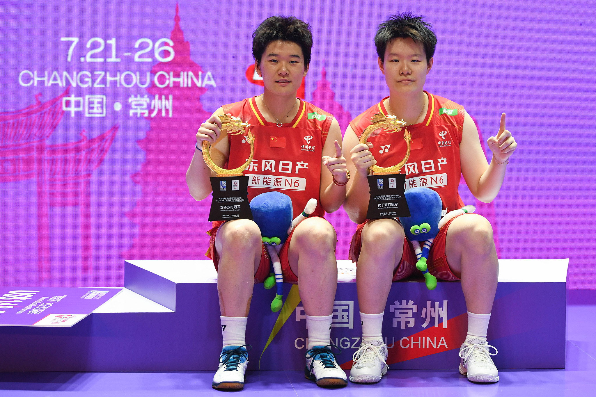 China's Liu Shengshu (R) and Tan Ning celebrate after beating Japan's Yuki Fukushima and Mayu Matsumoto in the women's doubles final at the BWF China Open in Changzhou, east China's Jiangsu Province, July 26, 2026. /VCG