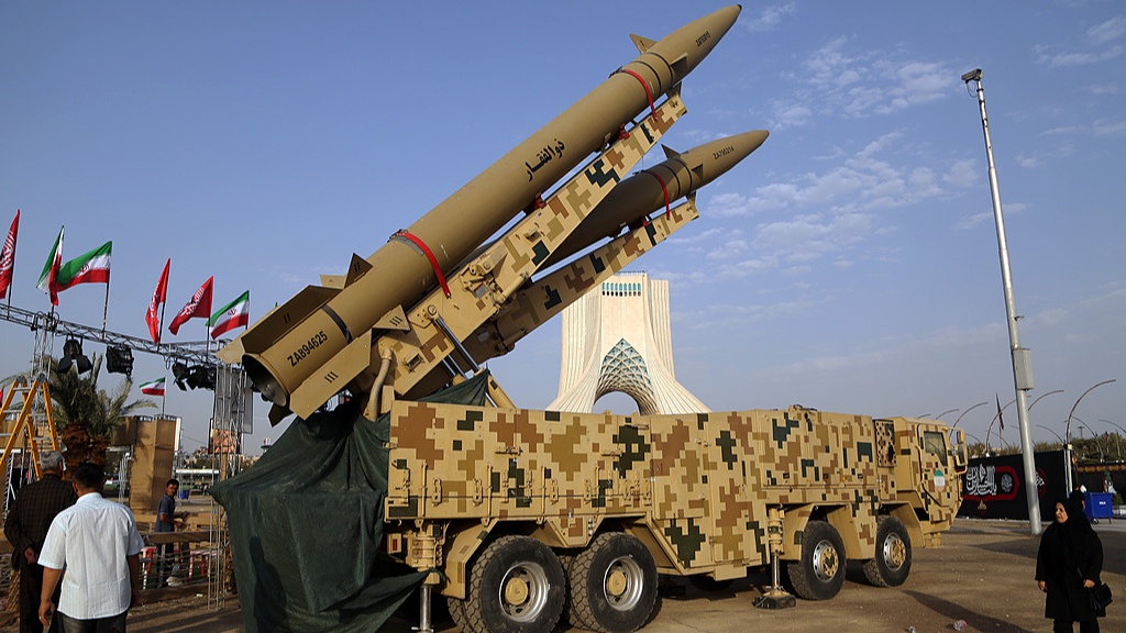 Zolfaghar and Qadr missiles alongside a metal model of a mini submarine are displayed at Azadi Square in Tehran, Iran, July 24, 2026. /VCG