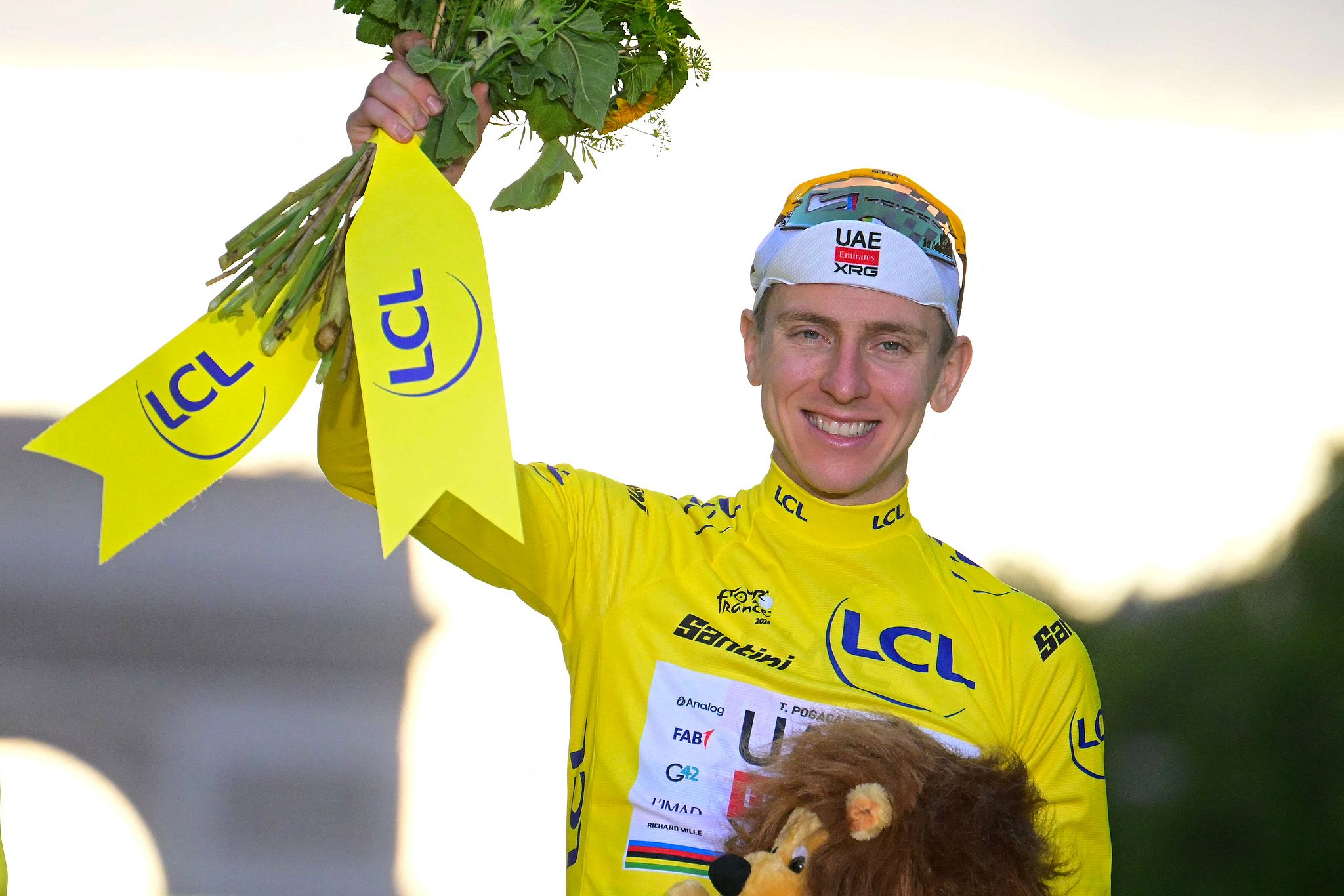 Slovenian cyclist Tadej Pogacar celebrates on the podium after winning the 113th edition of the Tour de France in Paris, France, July 26, 2026. /VCG