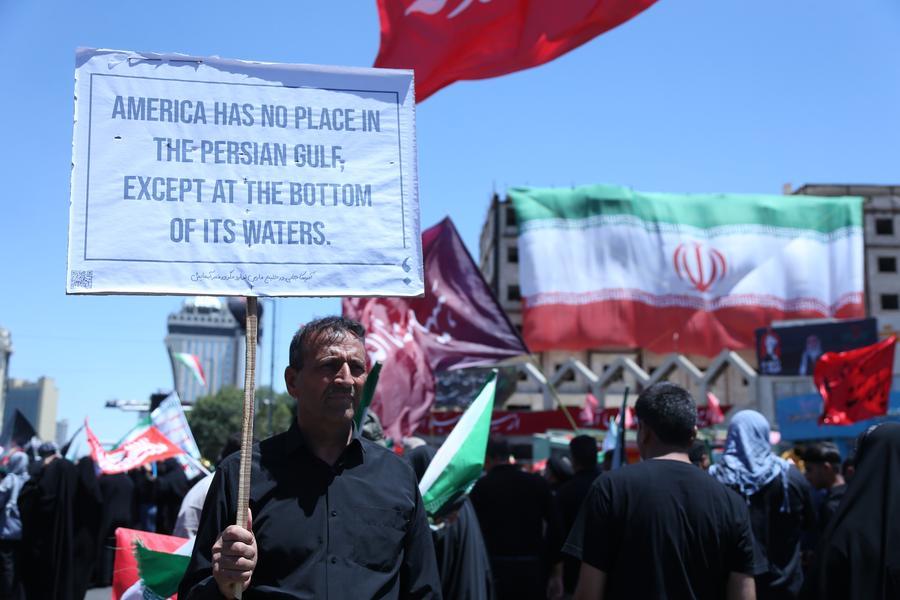 People attend the funeral procession of Iran's late Supreme Leader Ali Khamenei in Mashhad, Iran, July 9, 2026. /Xinhua