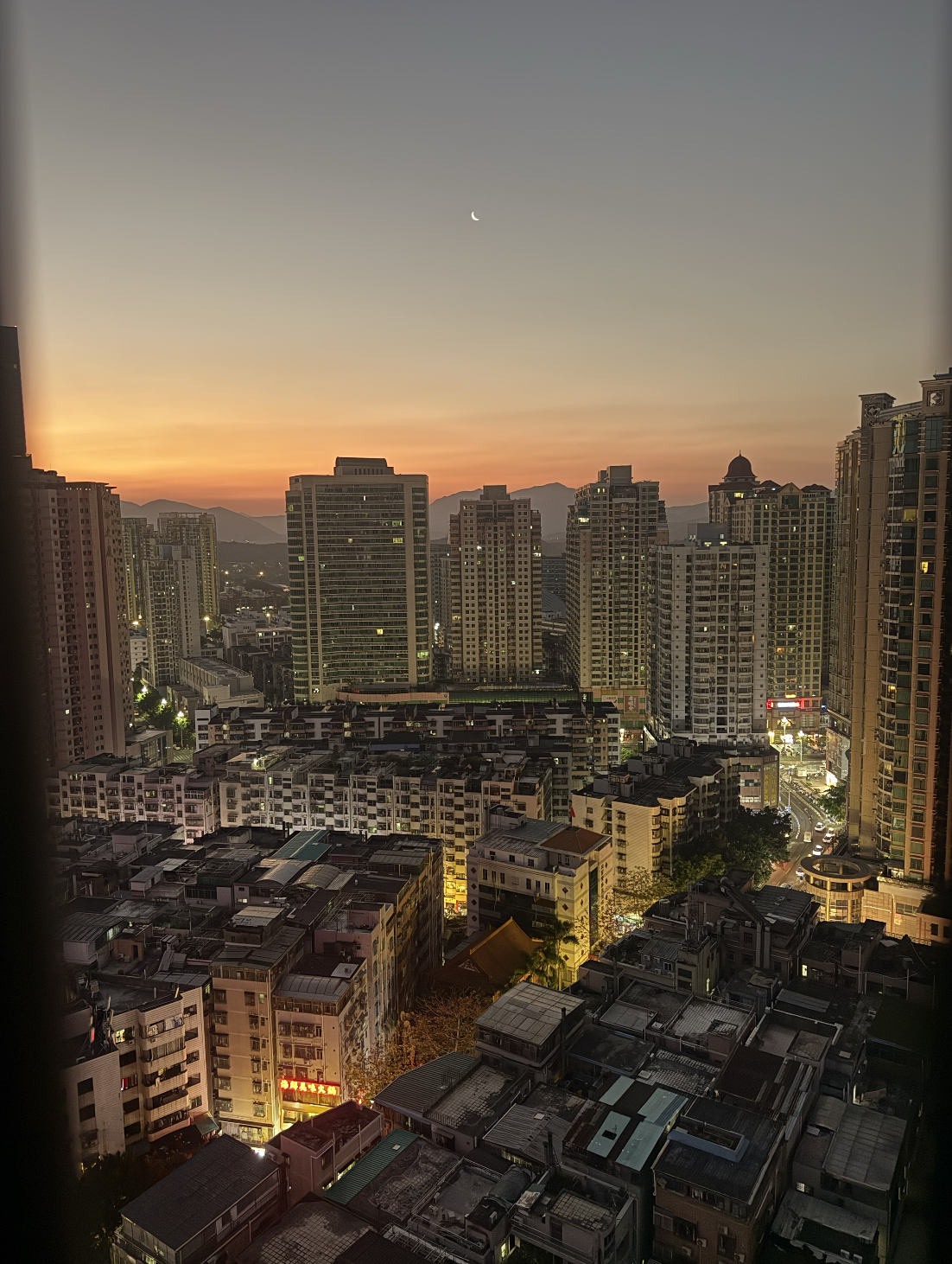 A view at the Xiangxicun urban village from a hotel window at dawn.
