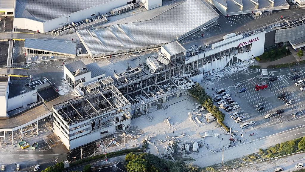 An aerial view shows damage to an Aeon Mall following an apparent explosion after a powerful earthquake in Kumamoto Prefecture, Japan, July 28, 2026. /VCG