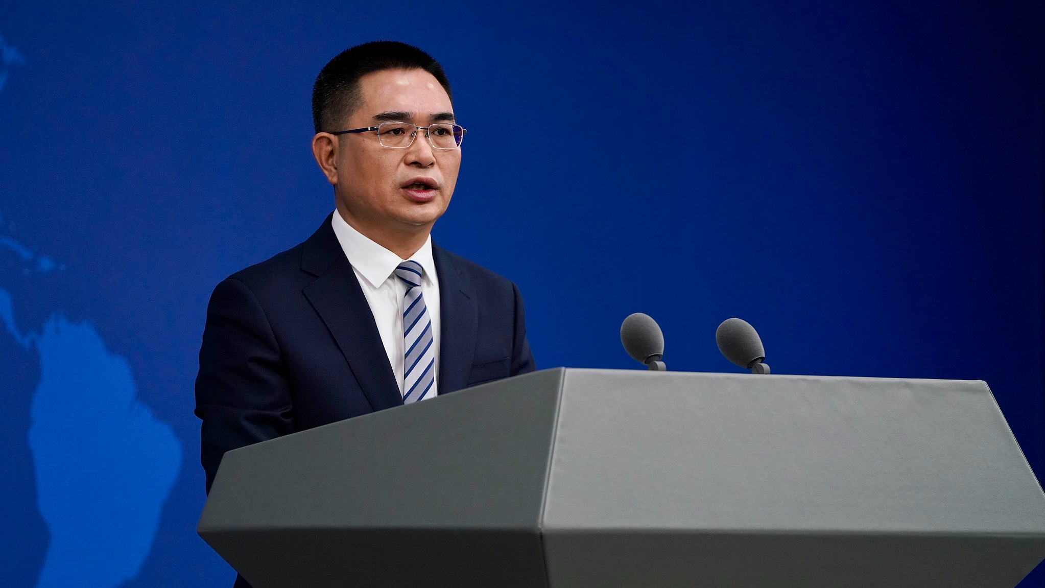 A file photo of Chen Binhua, spokesperson for the State Council Taiwan Affairs Office, answering questions at a press conference in Beijing, China. /VCG