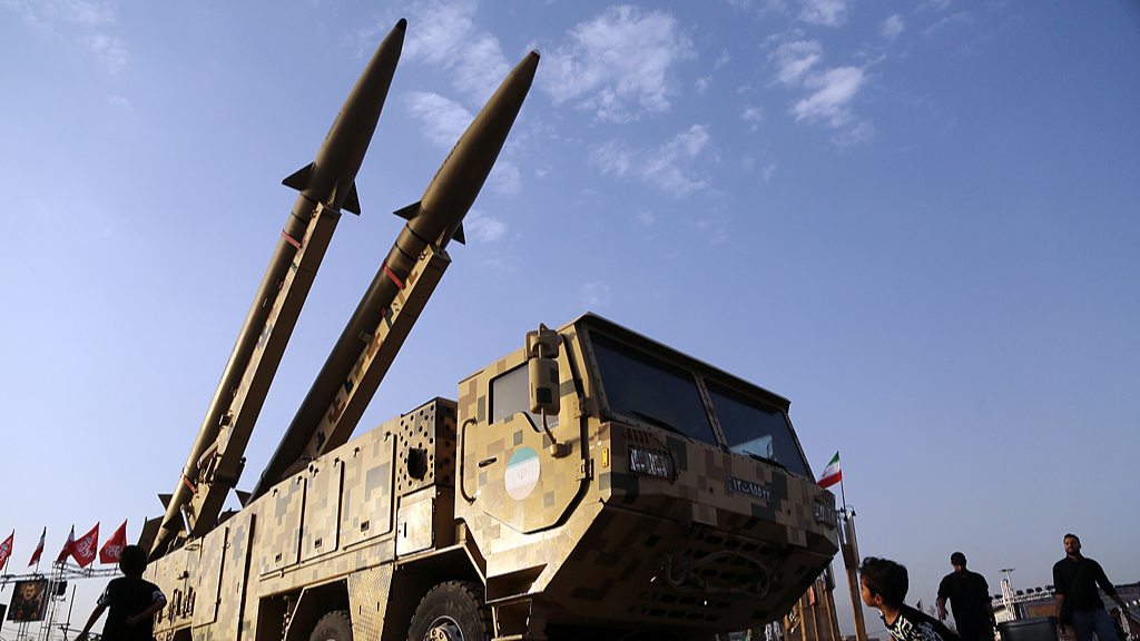 Zolfaghar and Qadr missiles alongside a metal model of a mini submarine are displayed at Azadi Square in Tehran, Iran, July 24, 2026. /VCG