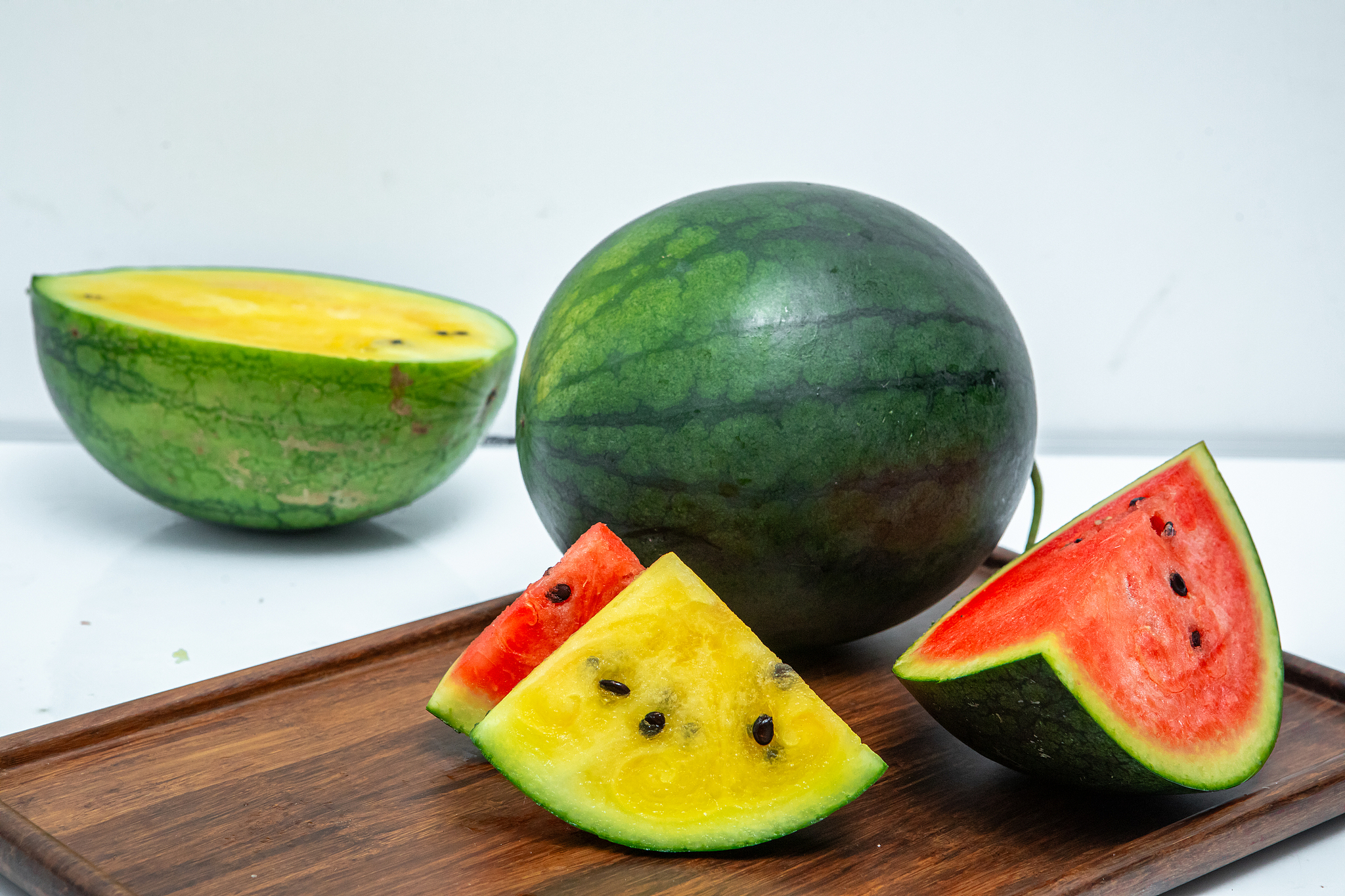 Watermelons of various flesh colors are shown in Guangzhou, May 27, 2024. /VCG