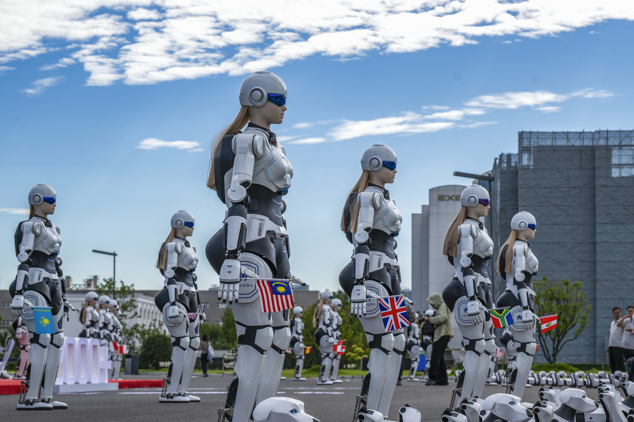 AiMOGA robots bound for export are seen during a delivery ceremony at Chery International Industrial Park in Wuhu, east China's Anhui Province, on July 30, 2026. /VCG