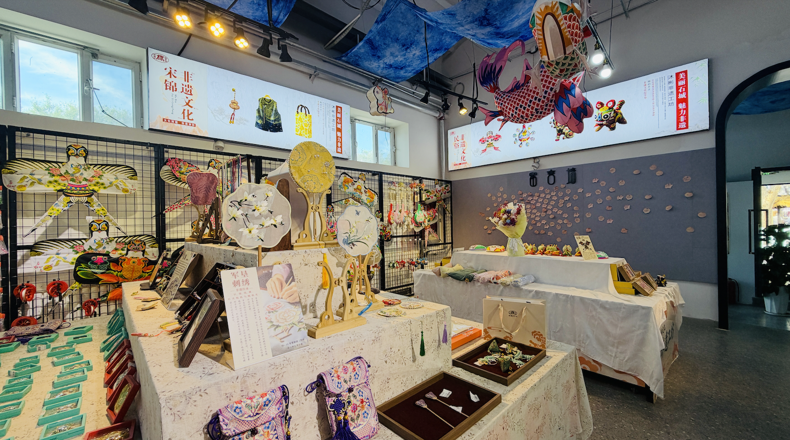 Diverse intangible cultural heritage artworks are displayed at the Bayi Sugar Factory in Shehezi, Xinjiang Uygur Autonomous Region on July 30, 2026. /CGTN