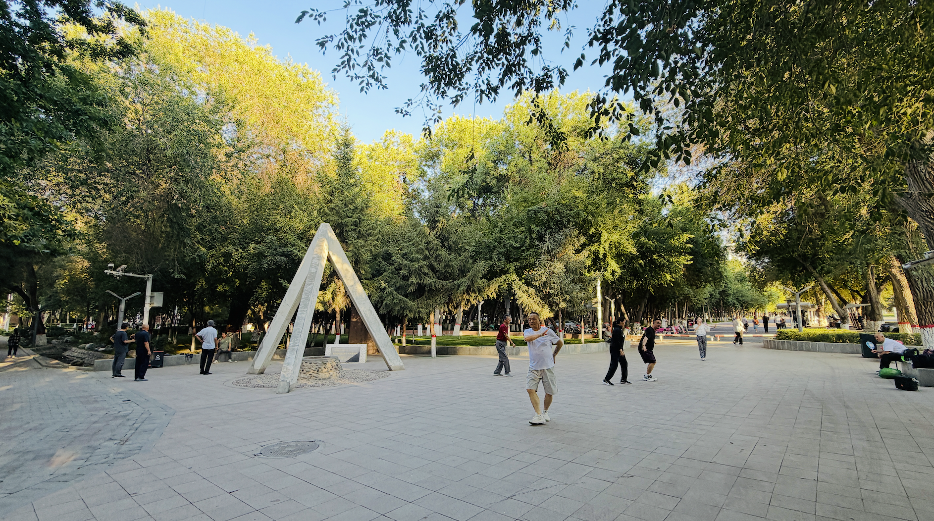 Locals dance leisurely at a local park, Shihezi, Xinjiang Uygur Autonomous Region, adding vibrant vitality to the summer urban scenery. /CGTN